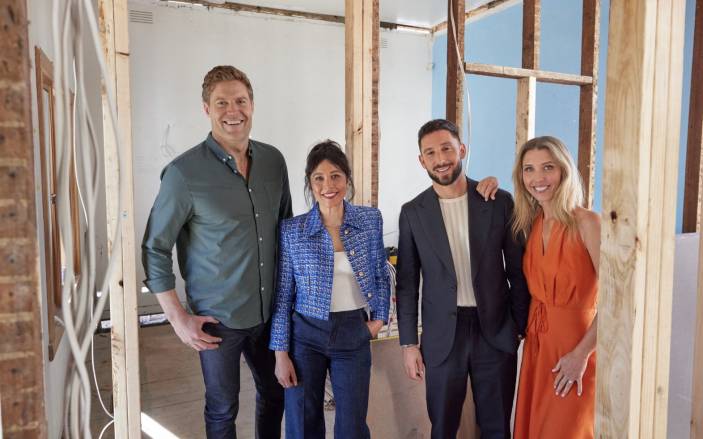 Dream Home Host and Judges standing in an unrenovated room.